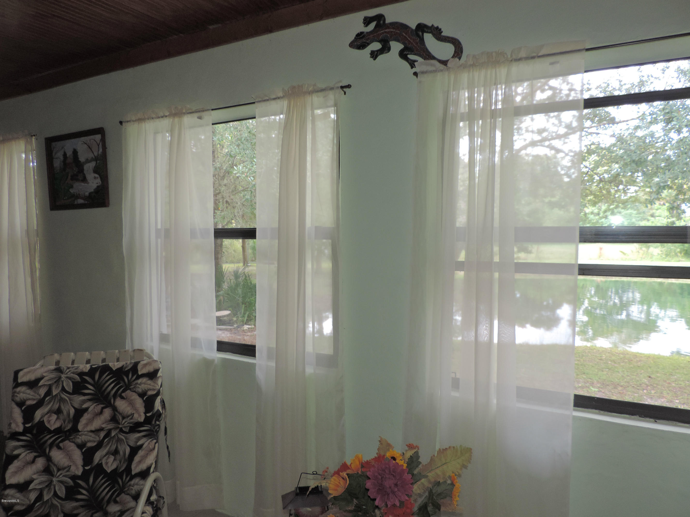 4240 Corey Road Grant Valkaria, FL 32950 - Photo 15 of 51 patio windows