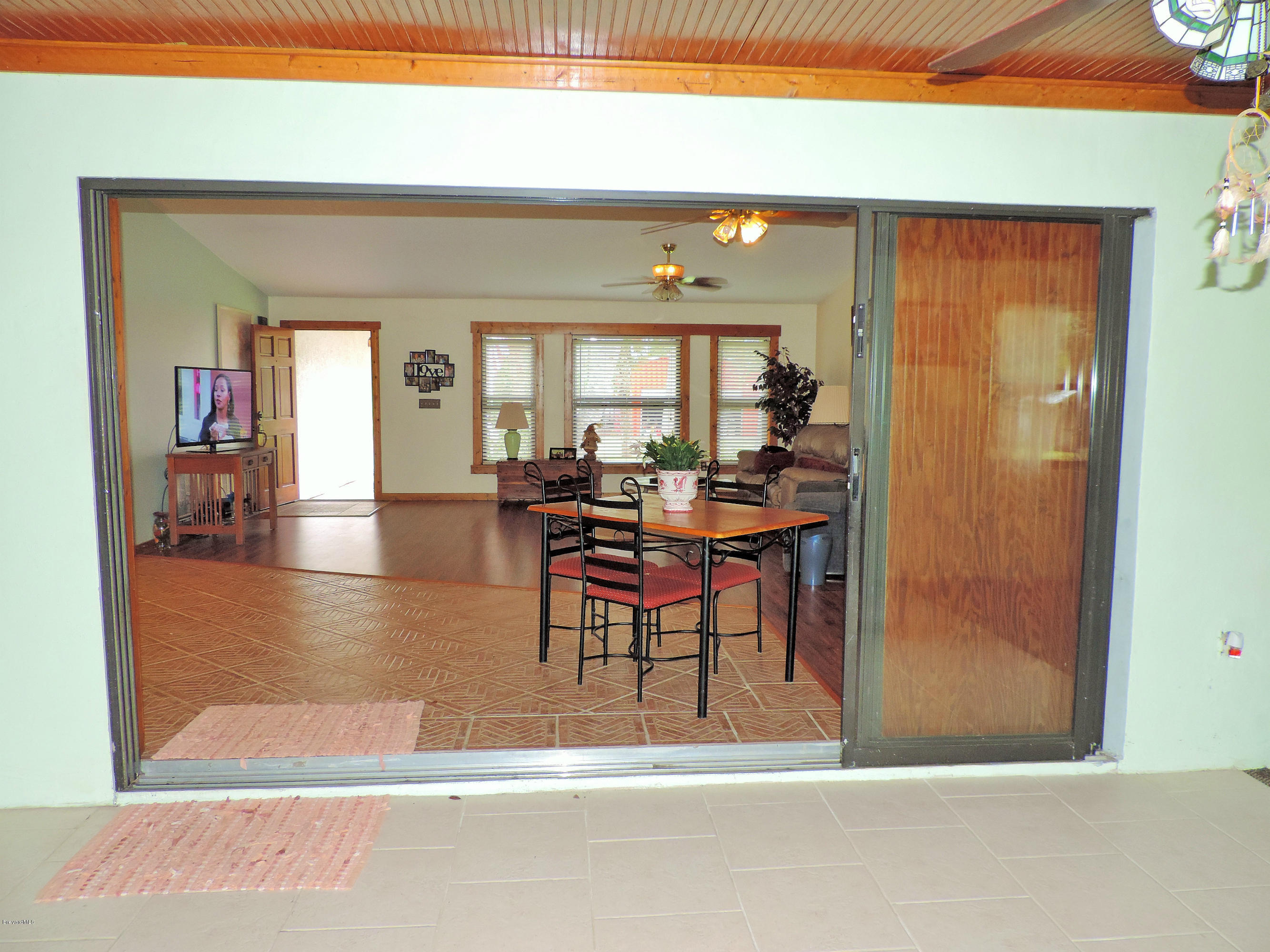 4240 Corey Road Grant Valkaria, FL 32950 - Photo 18 of 51 from patio to living