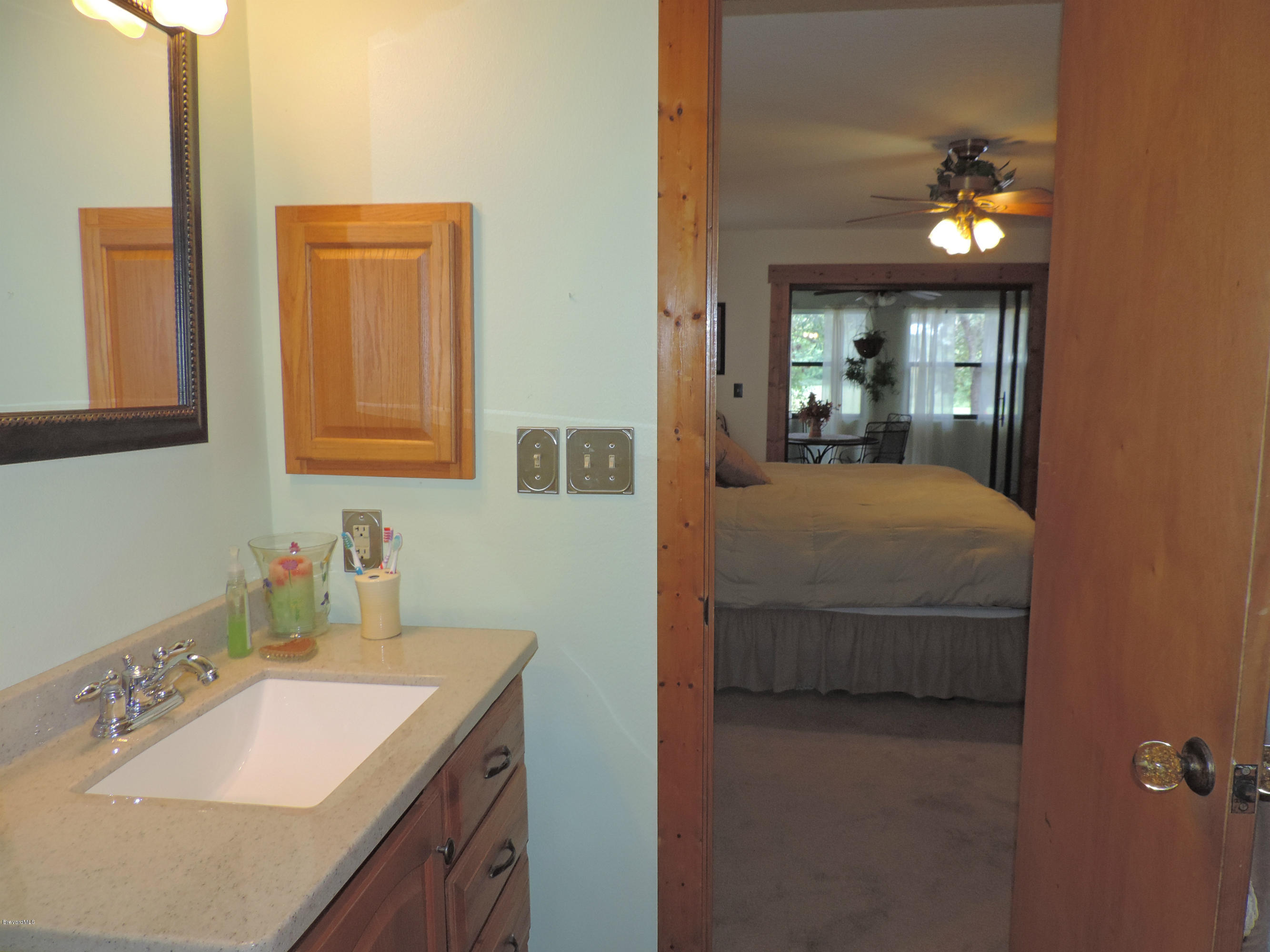 4240 Corey Road Grant Valkaria, FL 32950 - Photo 23 of 51 masterbath exit