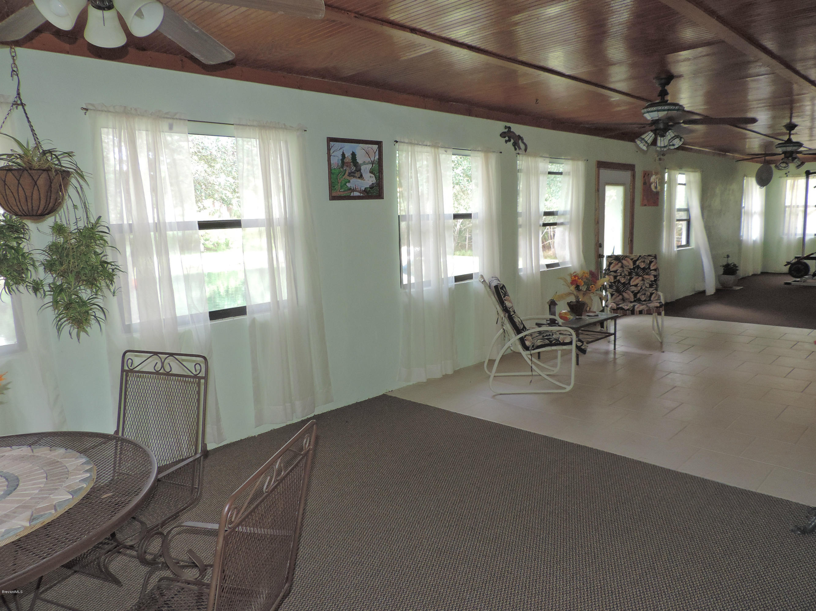 4240 Corey Road Grant Valkaria, FL 32950 - Photo 26 of 51 patio from master