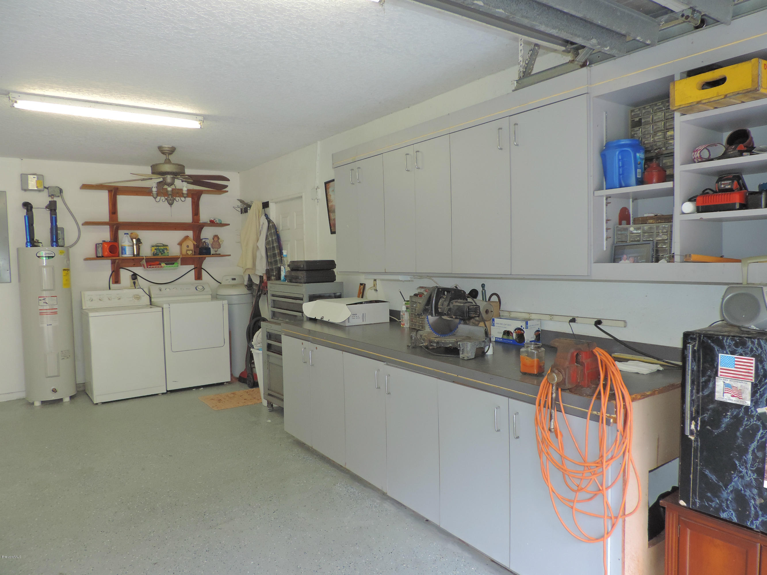4240 Corey Road Grant Valkaria, FL 32950 - Photo 42 of 51 garage work bench