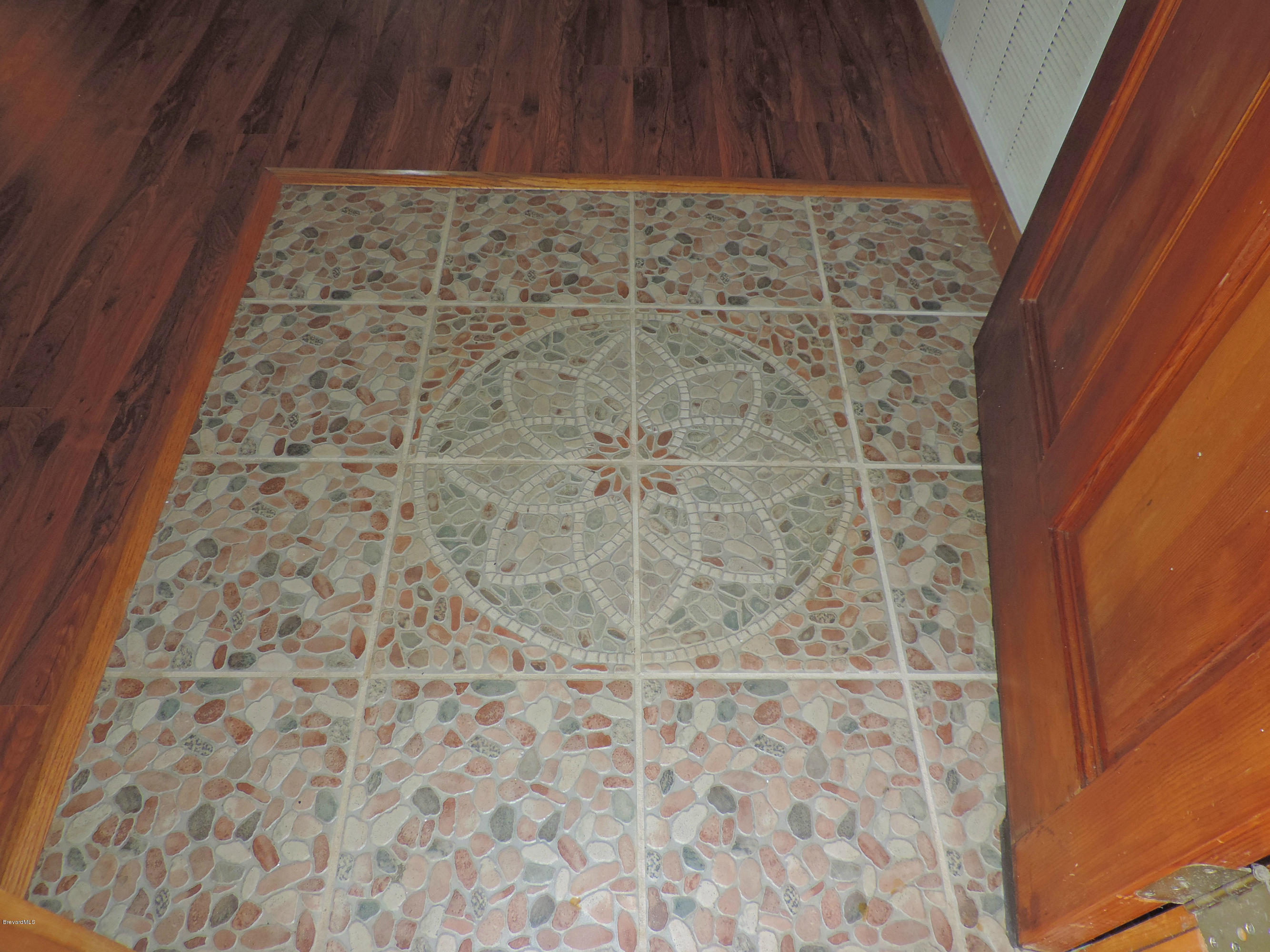 4240 Corey Road Grant Valkaria, FL 32950 - Photo 6 of 51 front enterance tile