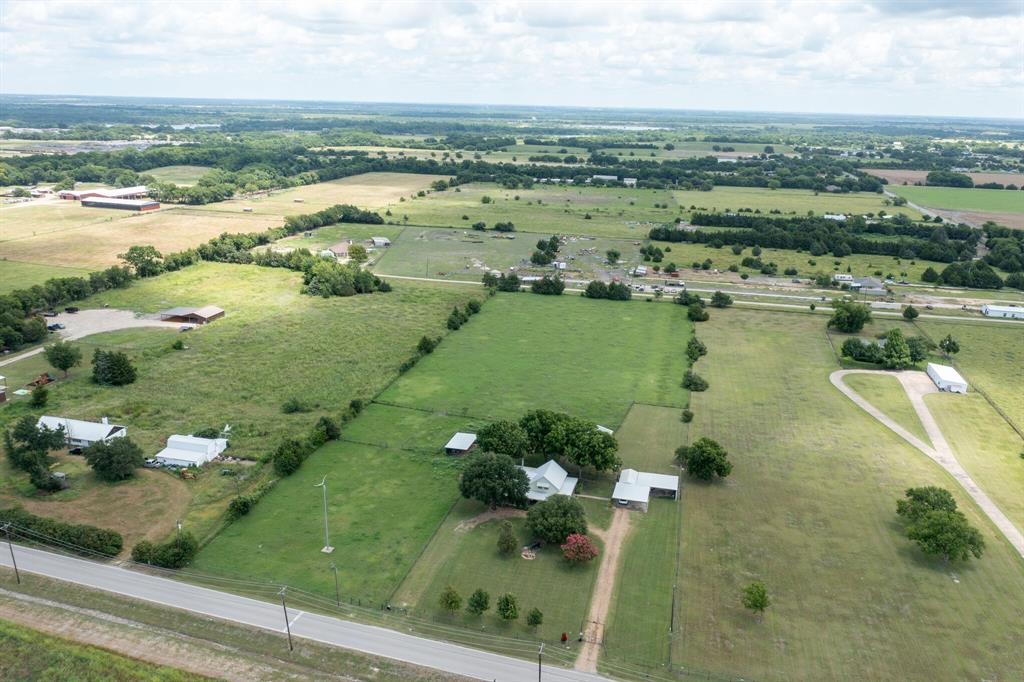 330 South Goode Road Wilmer, TX 75172 - Photo 12 of 38 a view of a lake with a houses