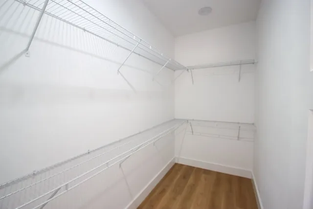 a view of a room with racks on the wall