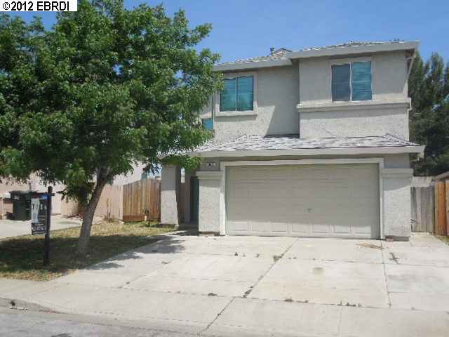 348 Fall Circle Oakley, CA 94561 - Photo 1 of 1 a house that has a tree in front of it