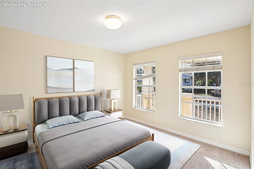 2719 West Union Street Tampa, FL 33607 - Photo 11 of 27 a bedroom with furniture and a window