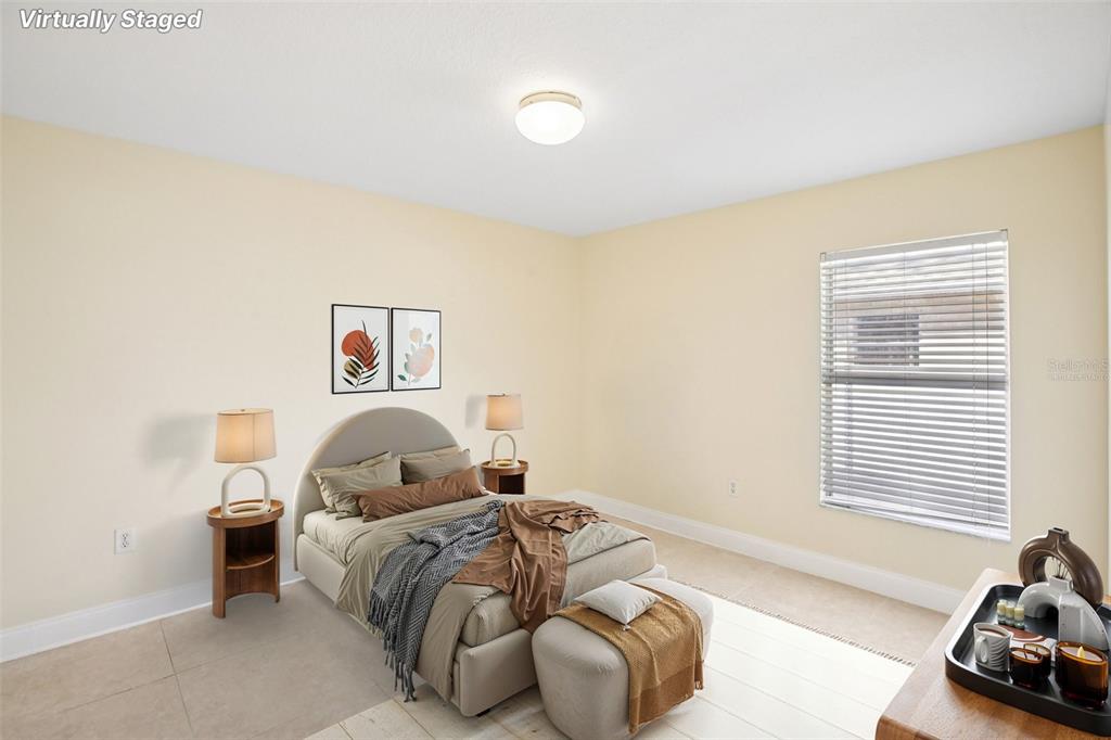 2719 West Union Street Tampa, FL 33607 - Photo 19 of 27 a bedroom with a bed and a window