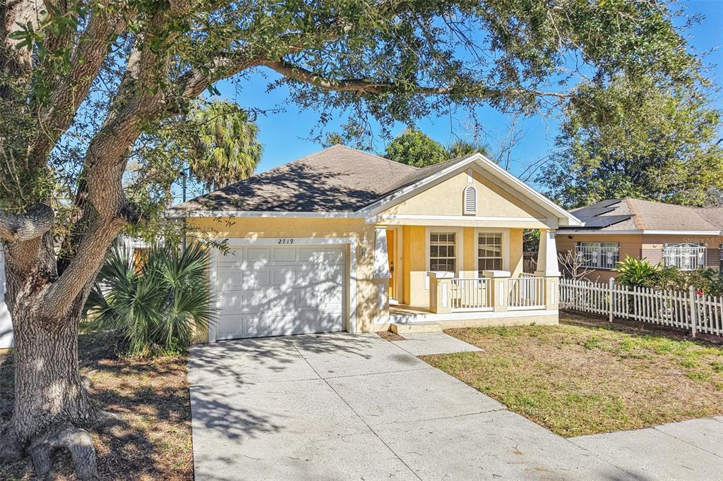 2719 West Union Street Tampa, FL 33607 - Photo 25 of 27 a front view of a house with a yard