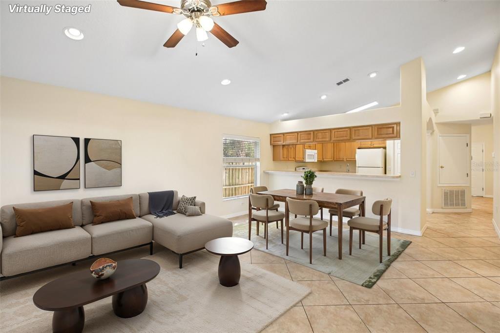 2719 West Union Street Tampa, FL 33607 - Photo 4 of 27 a living room with furniture and a large window