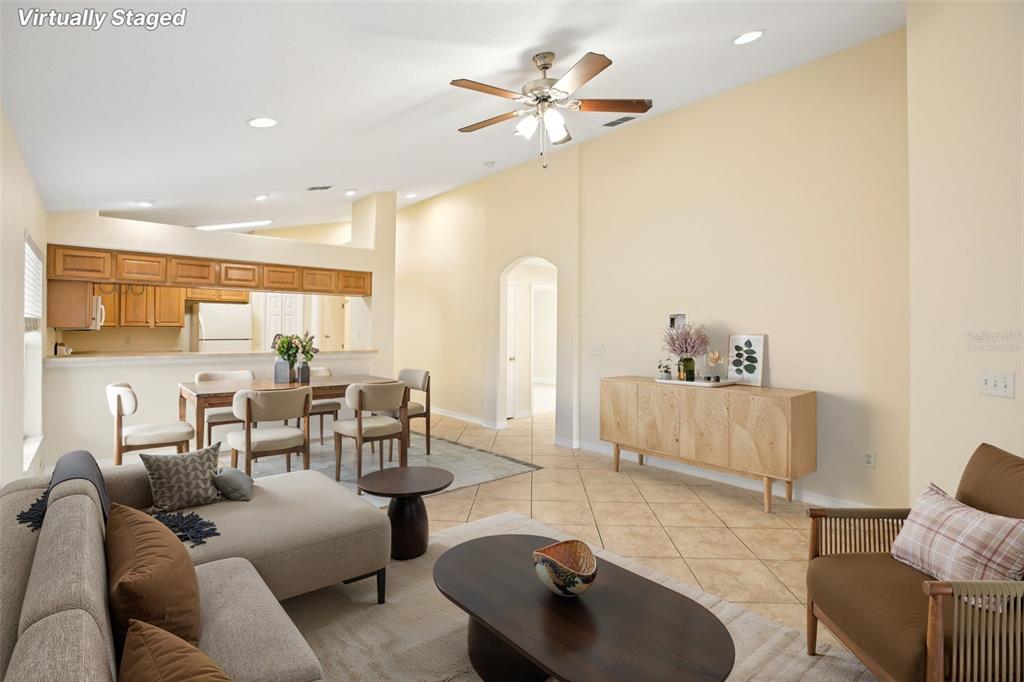 2719 West Union Street Tampa, FL 33607 - Photo 6 of 27 a living room with furniture and a chandelier