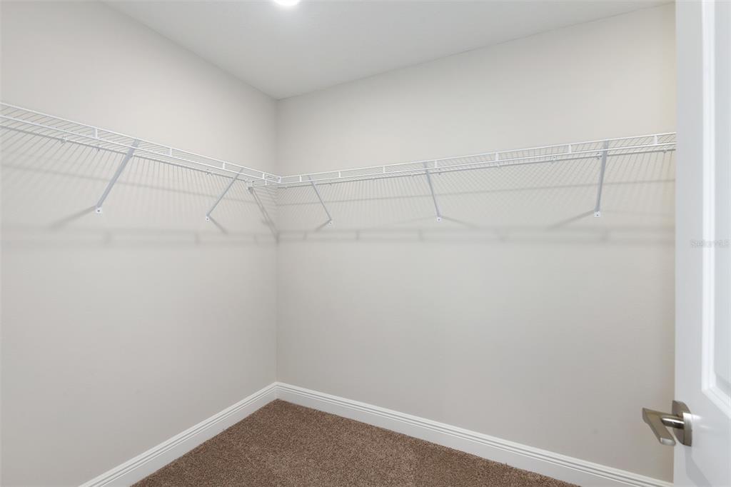6103 Southwest 97th Street Ocala, FL 34476 - Photo 9 of 26 a view of a rack on the wall