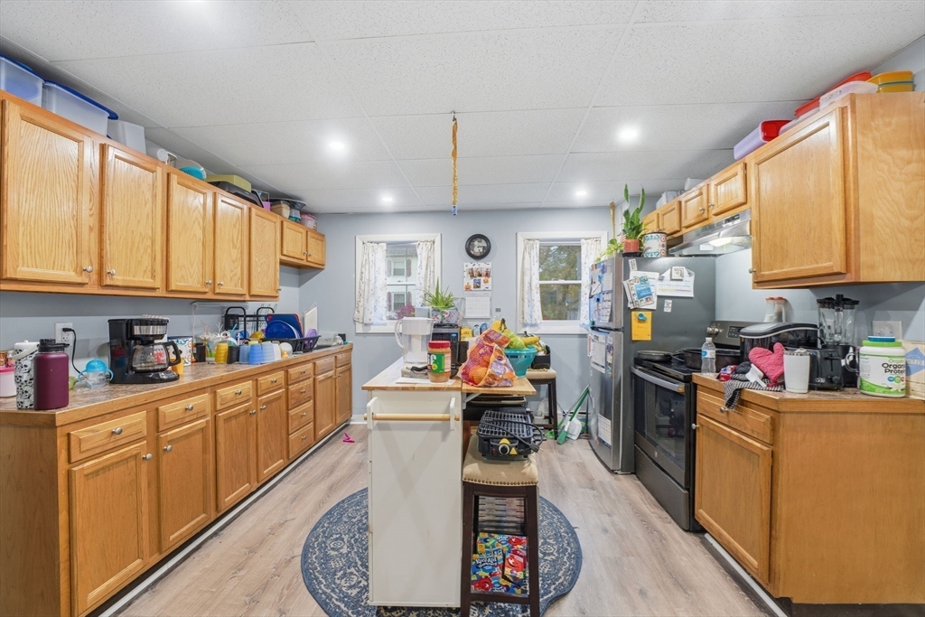 248-252 Church Street Burrillville, RI 02859 - Photo 13 of 26 a view of a kitchen with appliances and cabinets