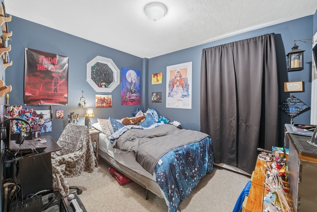 248-252 Church Street Burrillville, RI 02859 - Photo 19 of 26 a bedroom that has a bed and a closet