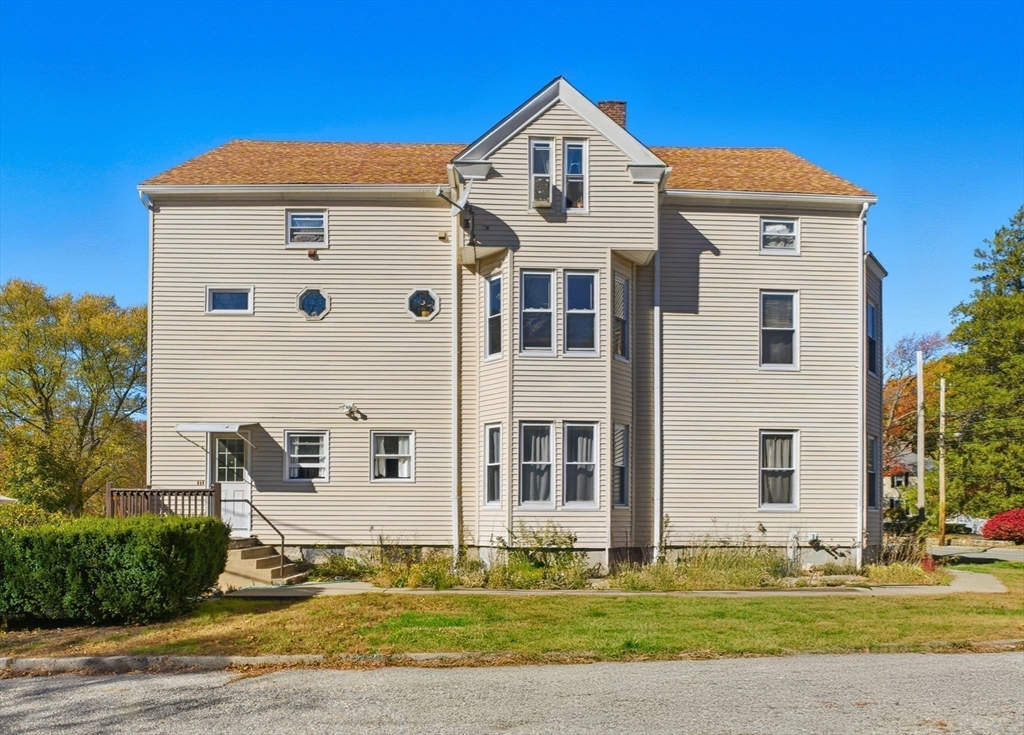248-252 Church Street Burrillville, RI 02859 - Photo 26 of 26 a front view of a house with a yard