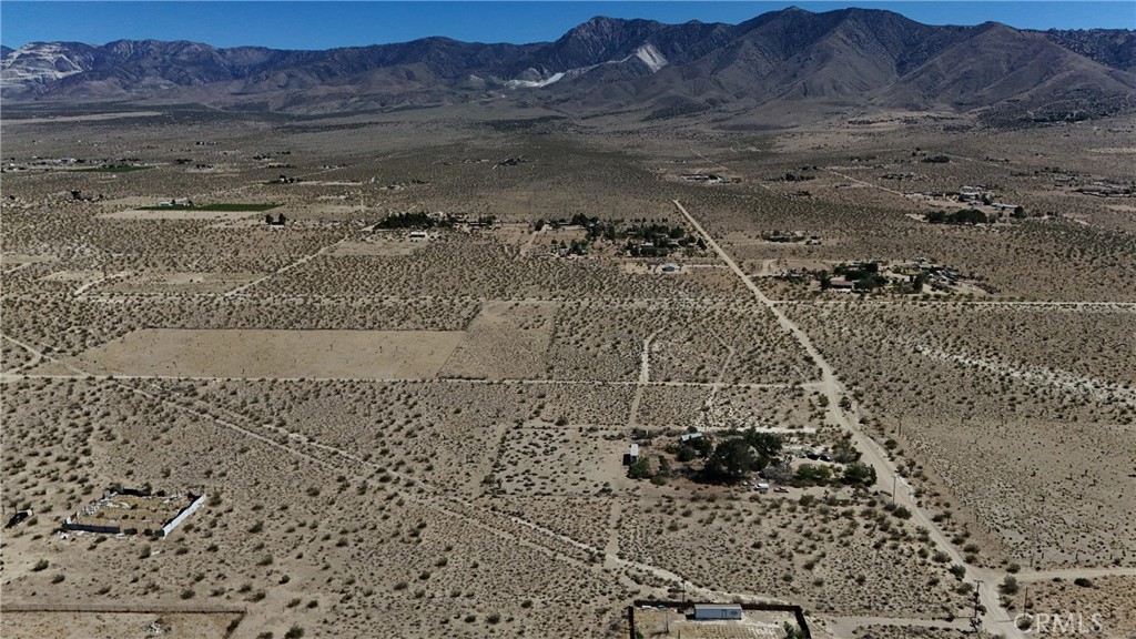 754 Ivanhoe Road Lucerne Valley, CA 92356 - Photo 6 of 13 a view of water heater and a field