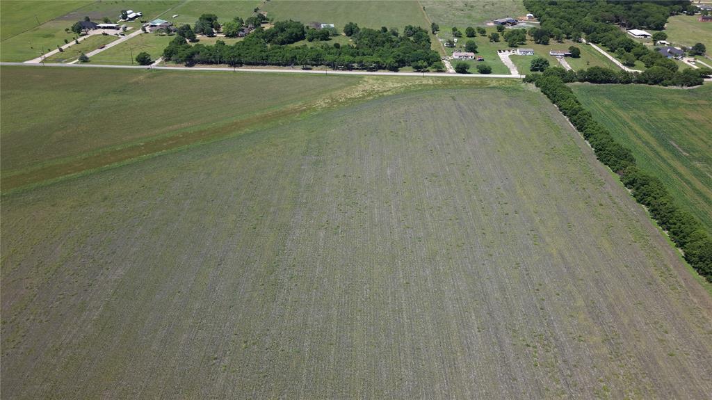0 Boyce Road Waxahachie, TX 75165 - Photo 3 of 5 a view of a green field with an ocean view