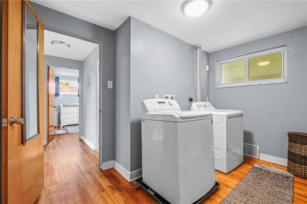 1654 Hollyrood Road Pittsburgh, PA 15227 - Photo 10 of 33 a utility room with dryer and washer