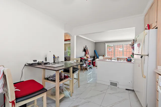 a view of a workspace with furniture