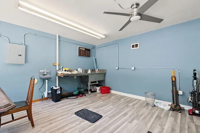 a room with furniture and a wooden floor