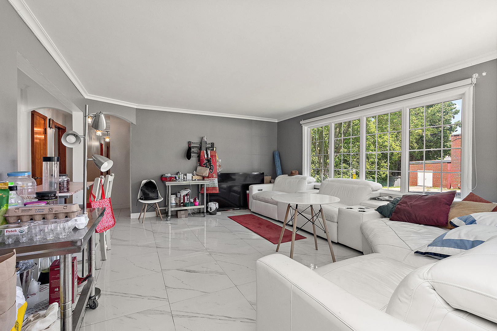 8420 Archer Avenue Willow Springs, IL 60480 - Photo 8 of 33 a living room with furniture and a large window