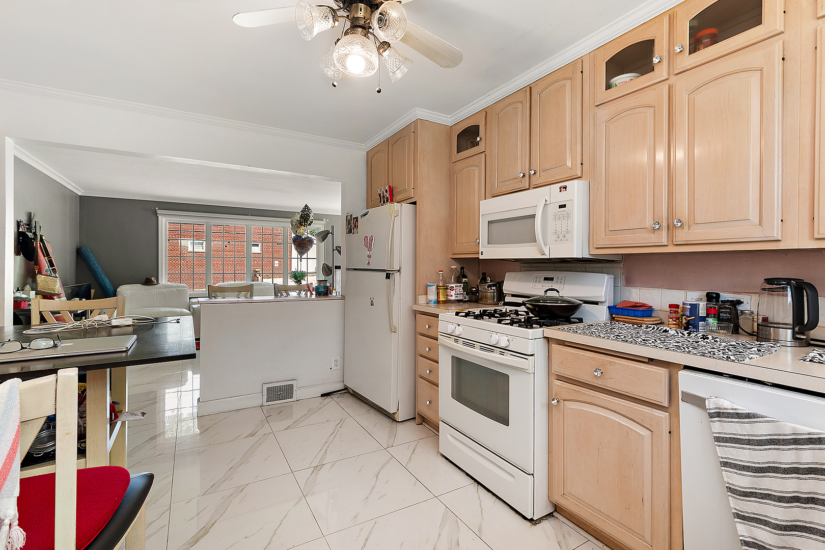 8420 Archer Avenue Willow Springs, IL 60480 - Photo 10 of 33 a kitchen with cabinets and window