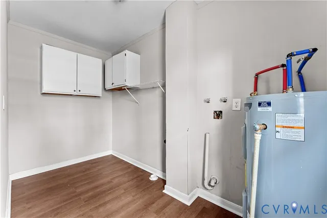 a view of walk in closet with white walls