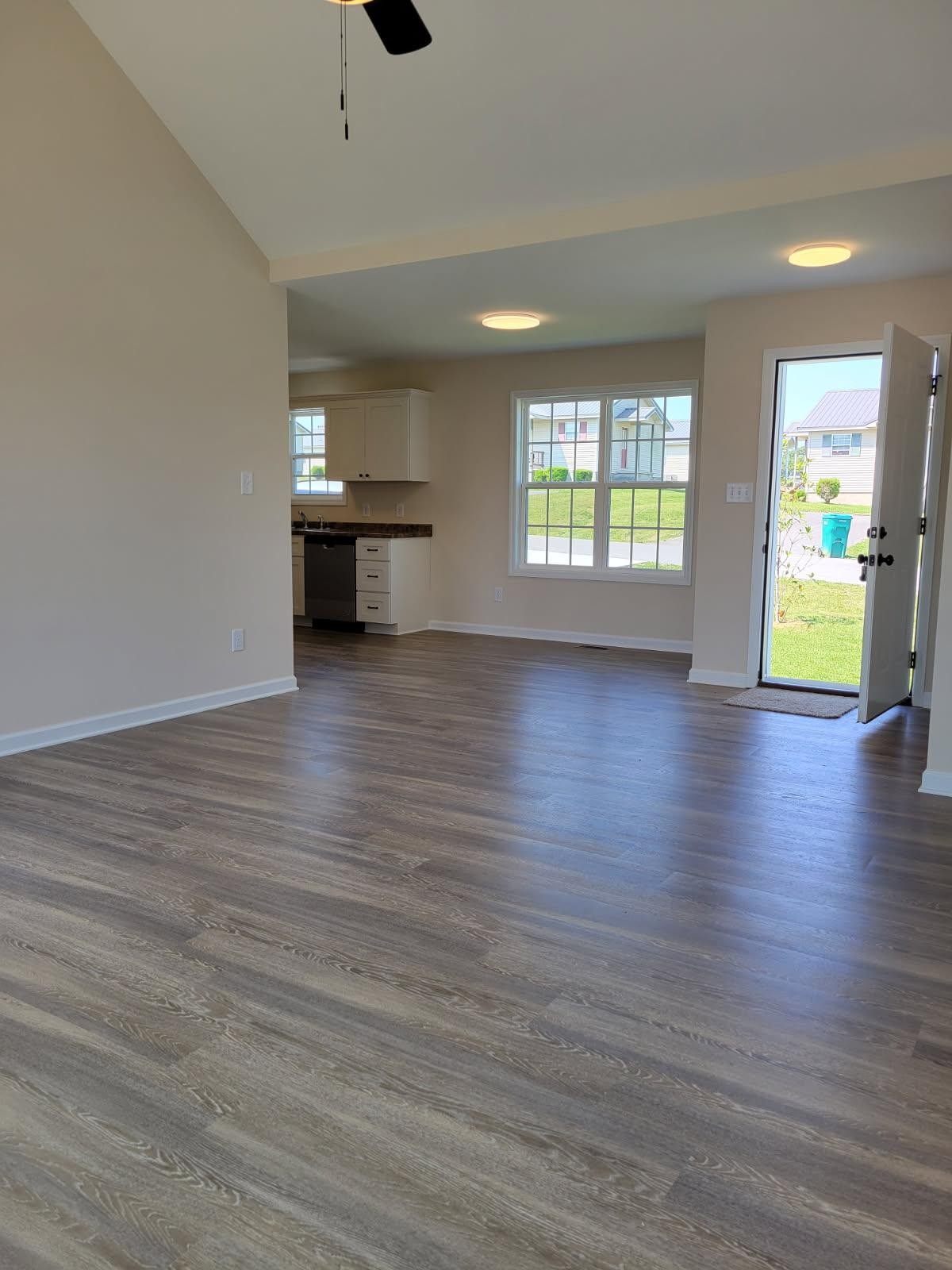 62 Modena Place Decherd, TN 37324 - Photo 15 of 31 an empty room with wooden floor and windows