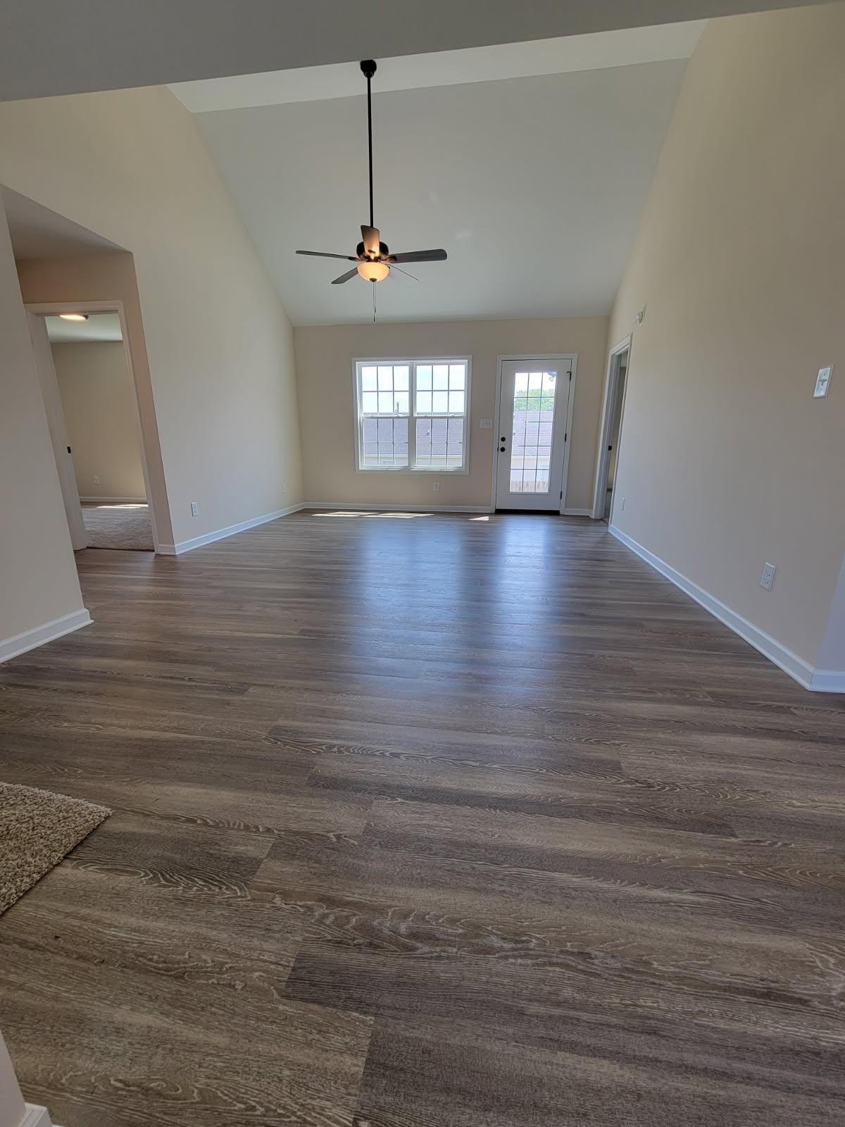 62 Modena Place Decherd, TN 37324 - Photo 29 of 31 a view of an empty room with glass door and window