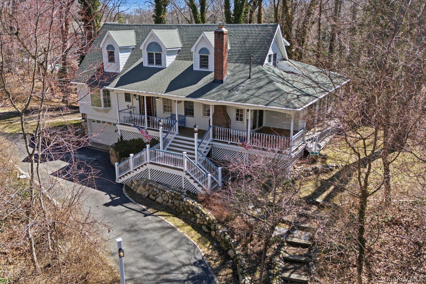45 Eastwood Road Miller Place, NY 11764 - Photo 2 of 45 a view of a house with a yard
