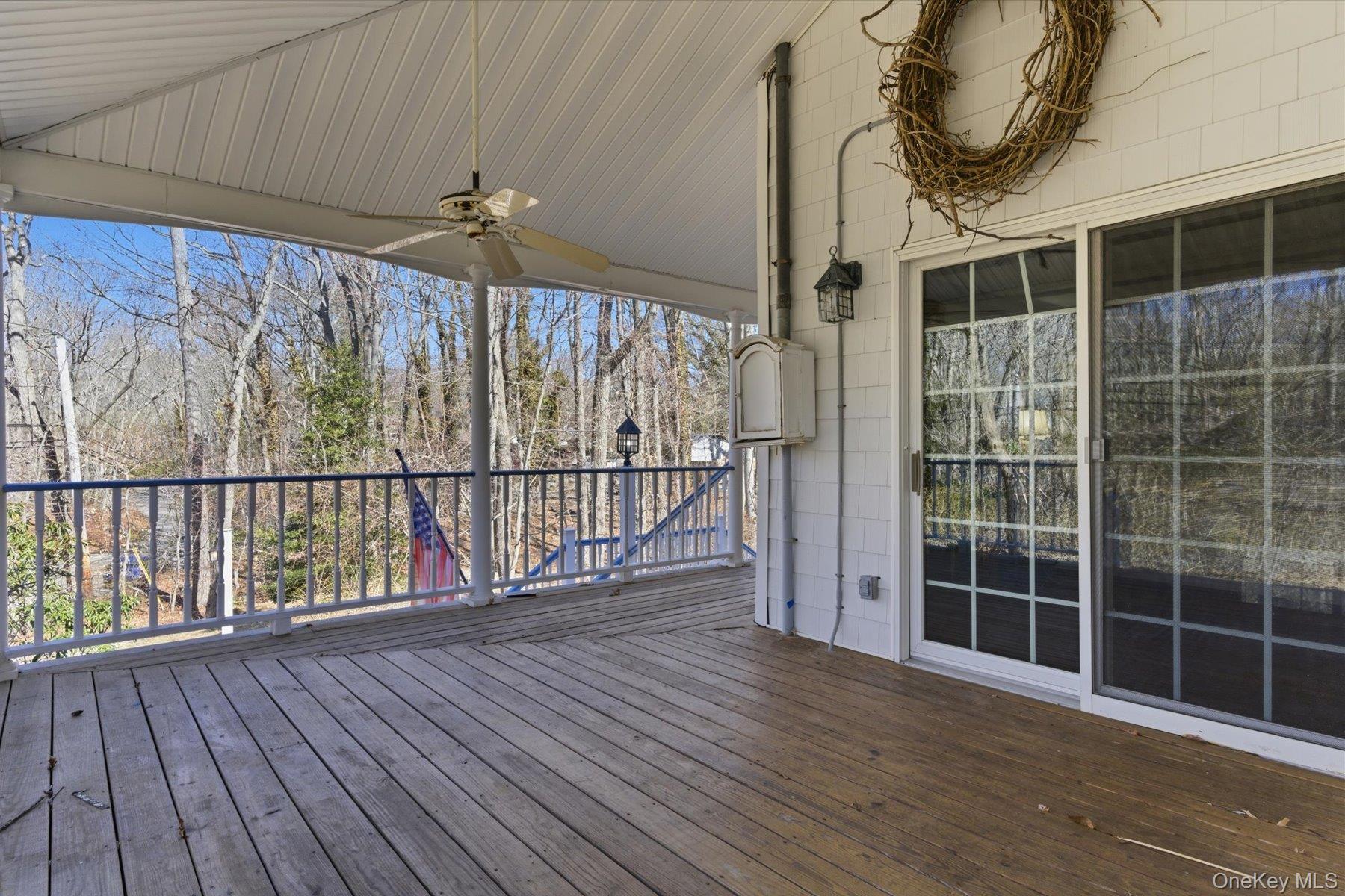 45 Eastwood Road Miller Place, NY 11764 - Photo 27 of 45 a view of balcony with wooden floor