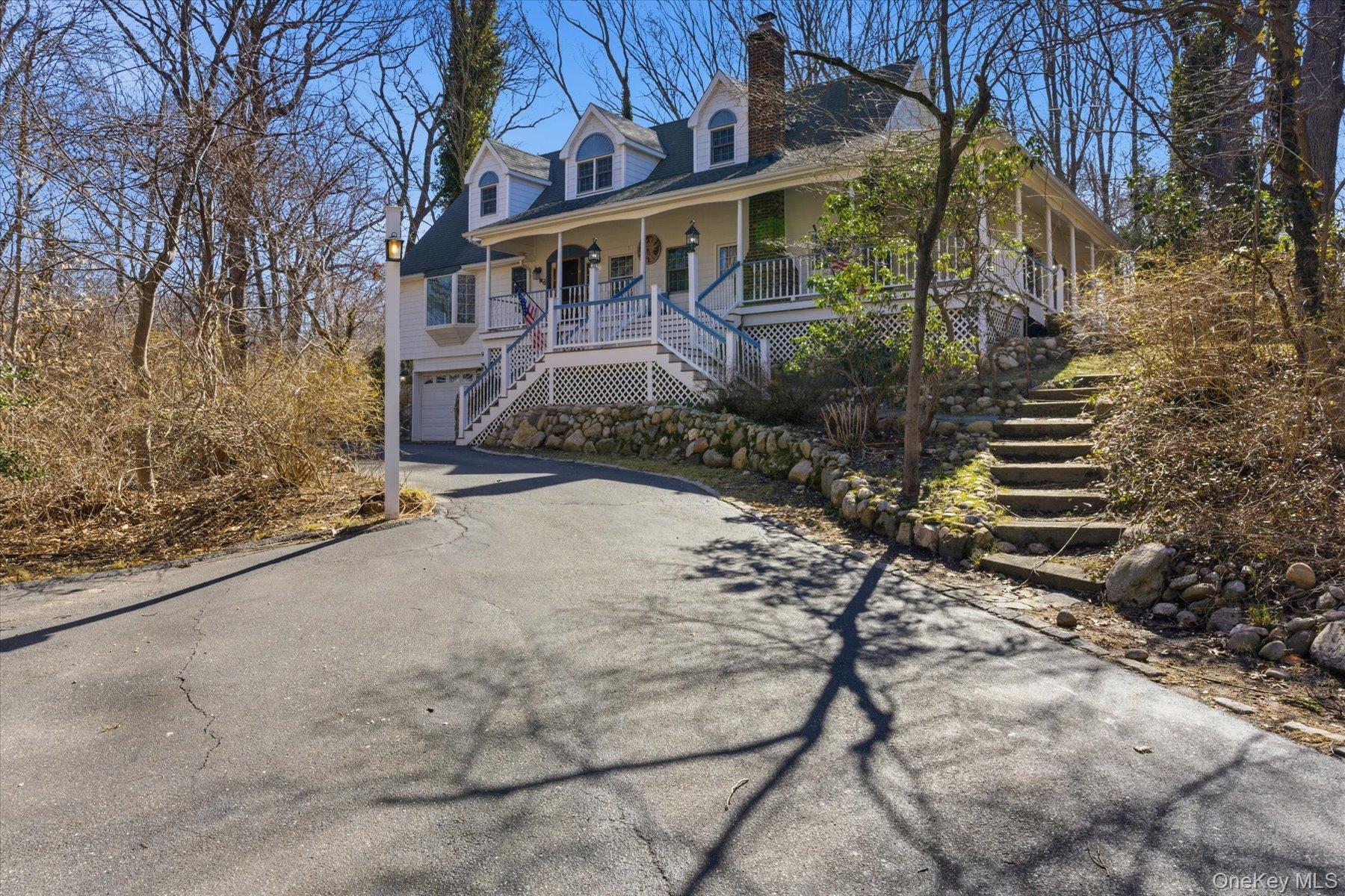 45 Eastwood Road Miller Place, NY 11764 - Photo 3 of 45 a view of a house with a yard