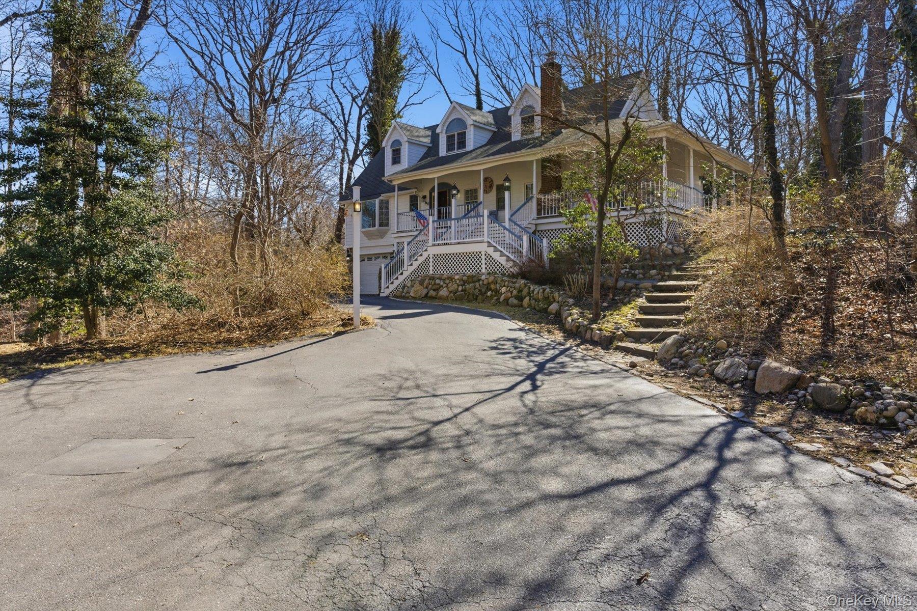 45 Eastwood Road Miller Place, NY 11764 - Photo 32 of 45 a view of a house with a yard