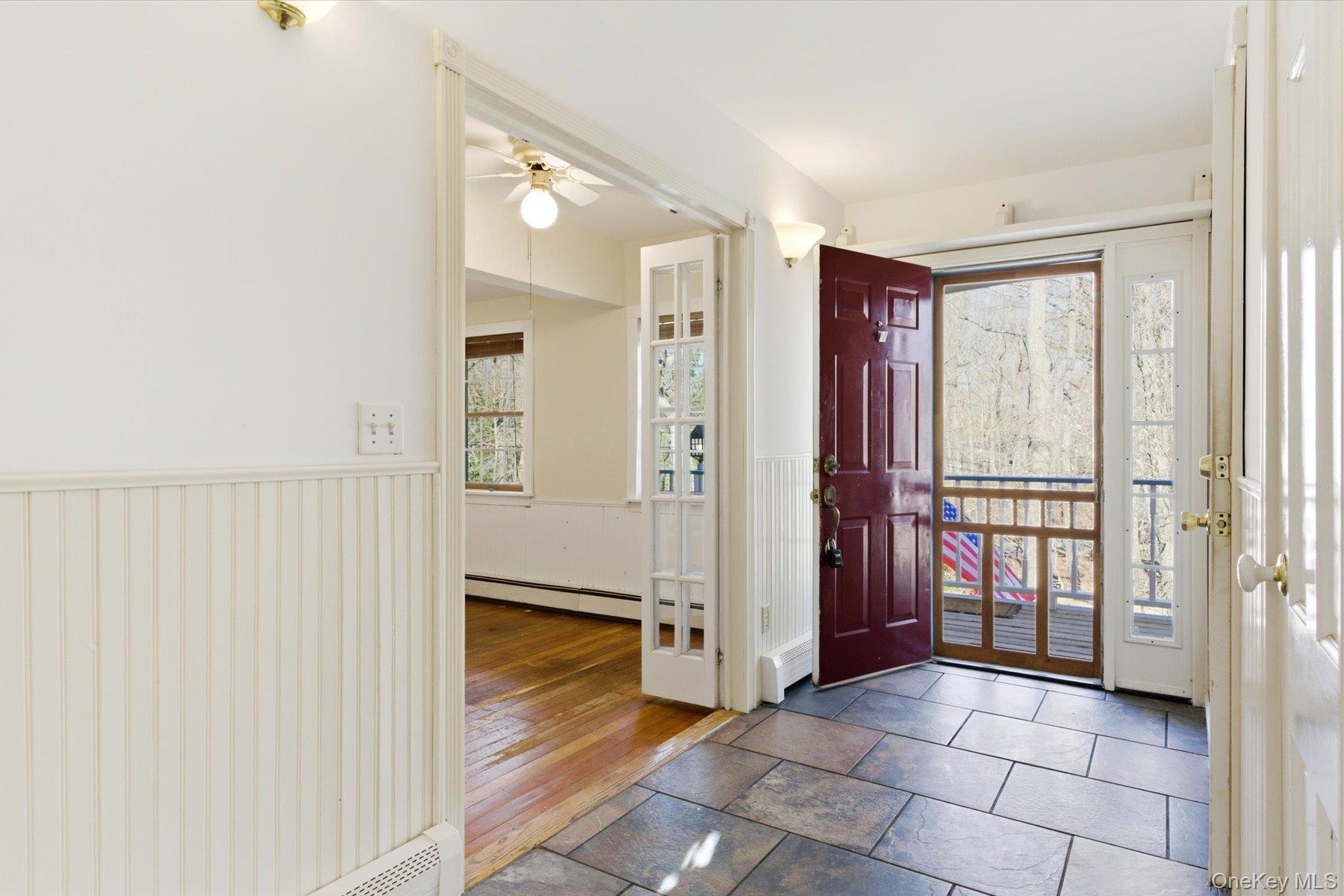 45 Eastwood Road Miller Place, NY 11764 - Photo 7 of 45 a view of front door with hallway