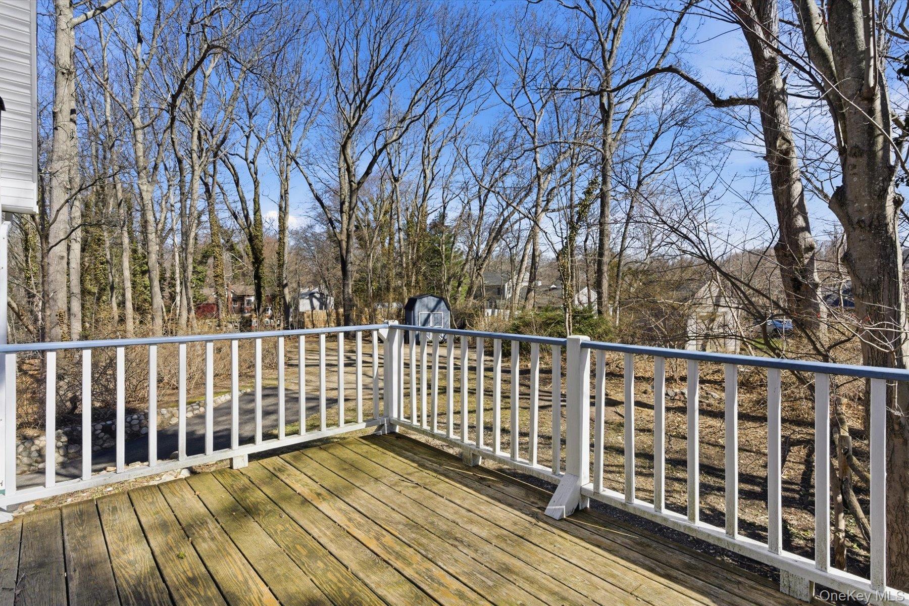 45 Eastwood Road Miller Place, NY 11764 - Photo 10 of 45 a view of a wooden roof deck