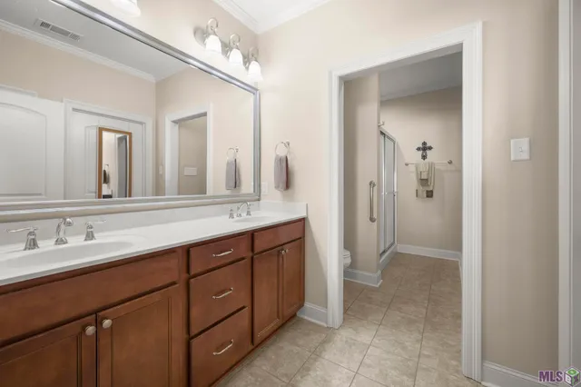 $305,000 | 7111 Village Maison Court, Unit 23, Baton Rouge, LA 70809