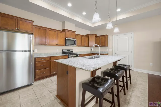 $305,000 | 7111 Village Maison Court, Unit 23, Baton Rouge, LA 70809