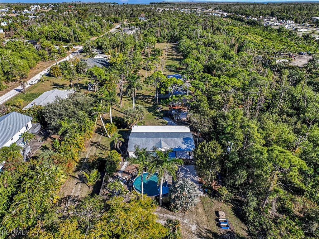 5228 Stringfellow Road St. James City, FL 33956 - Photo 29 of 35 a view of a garden with plants