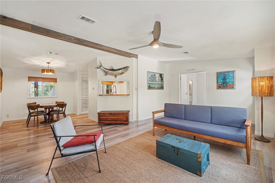 5228 Stringfellow Road St. James City, FL 33956 - Photo 3 of 35 a living room with furniture