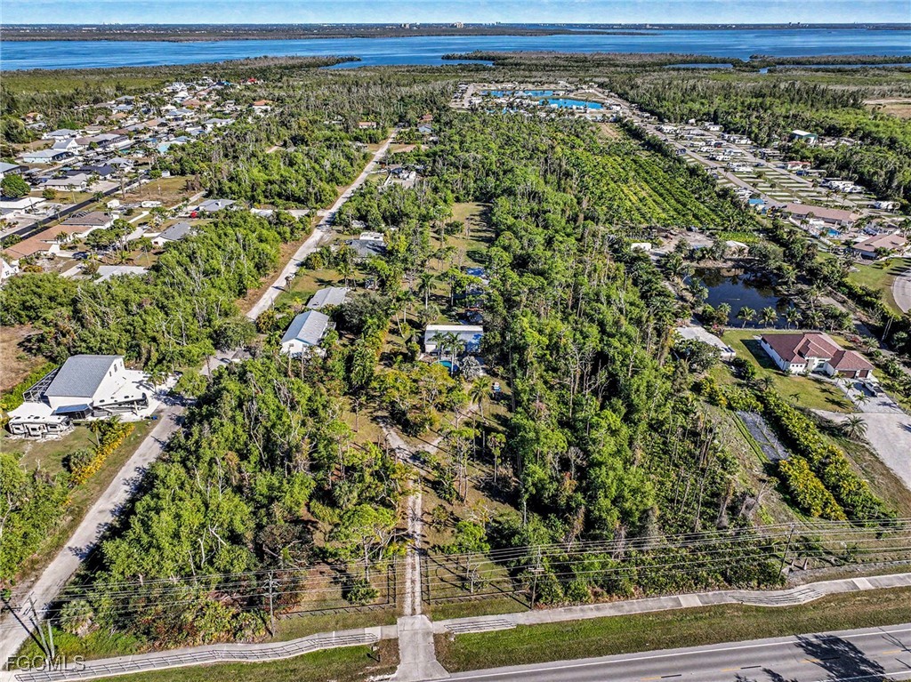 5228 Stringfellow Road St. James City, FL 33956 - Photo 33 of 35 a view of a yard with an outdoor space