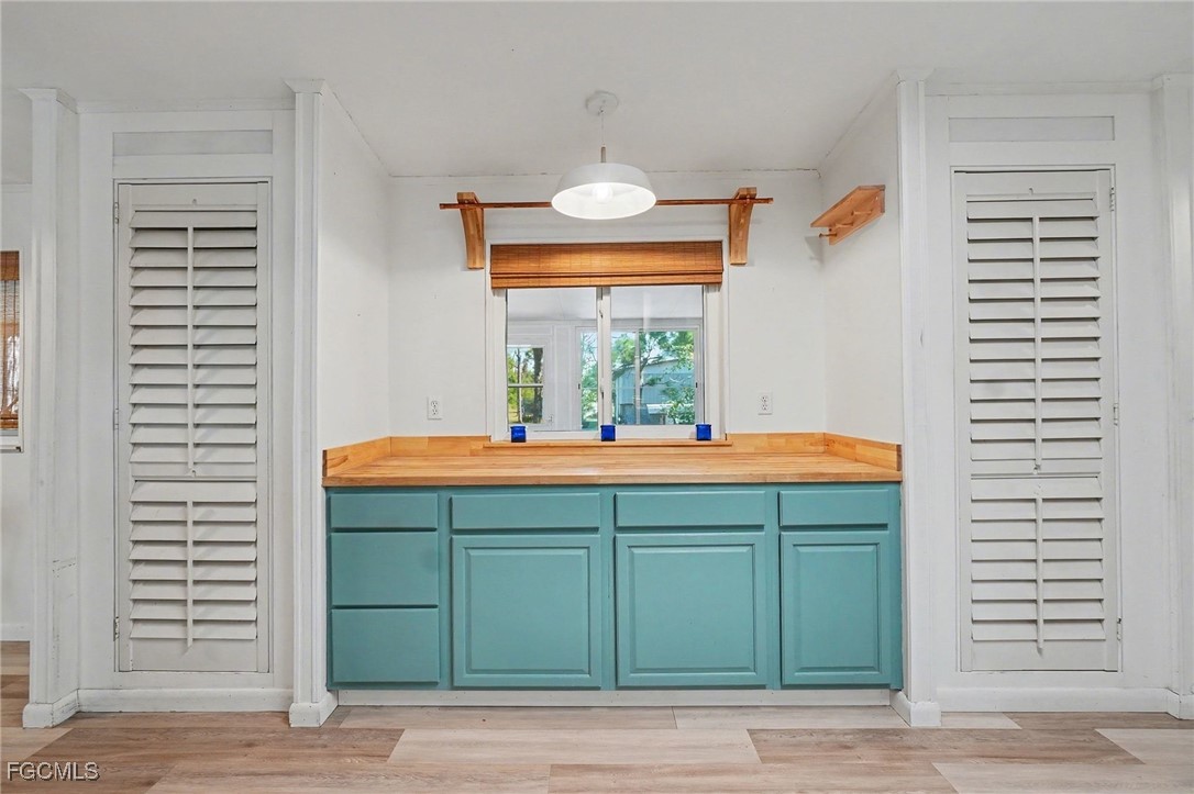 5228 Stringfellow Road St. James City, FL 33956 - Photo 9 of 35 a bathroom with a sink and a mirror