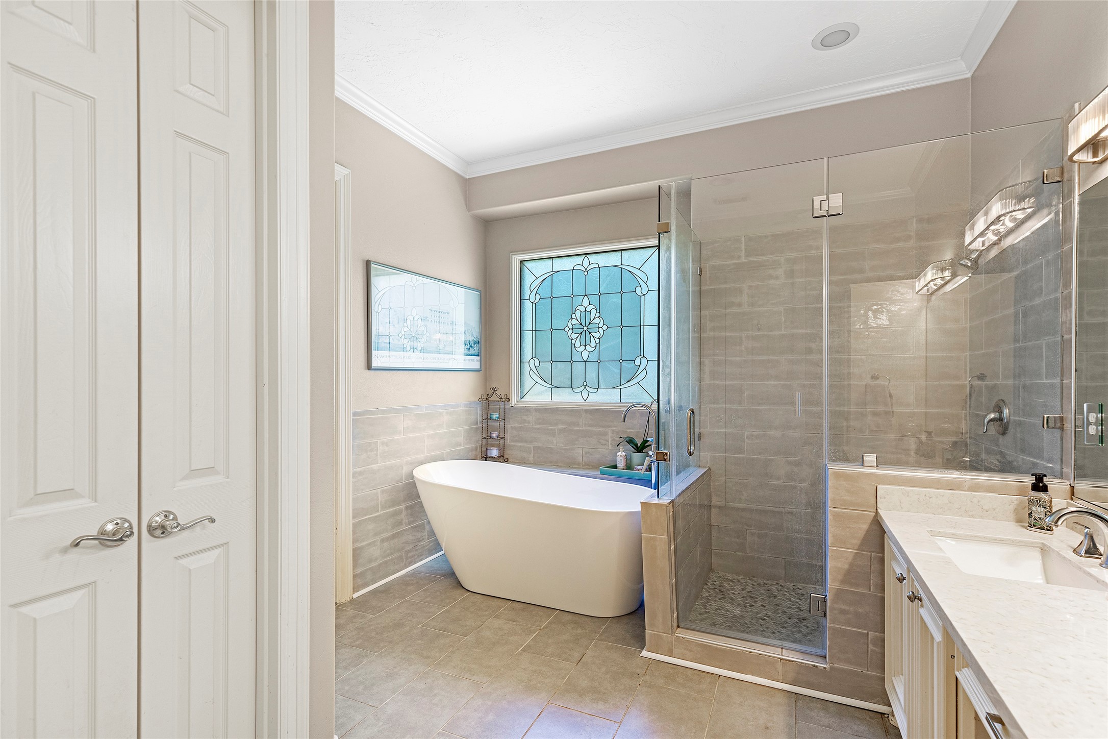 6530 Treaschwig Road, Unit 1 Spring, TX 77373 - Photo 21 of 32 a bathroom with a bathtub and shower
