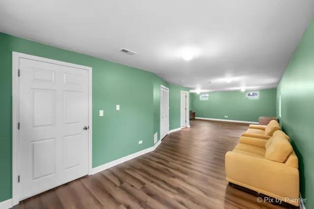 a view of livingroom with lounge chair