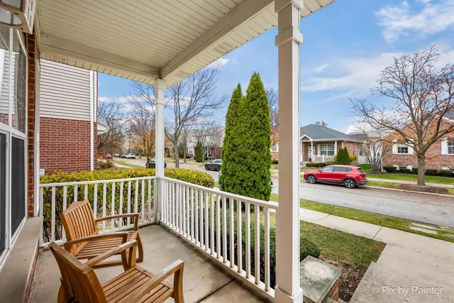 a view of a two chairs in the porch