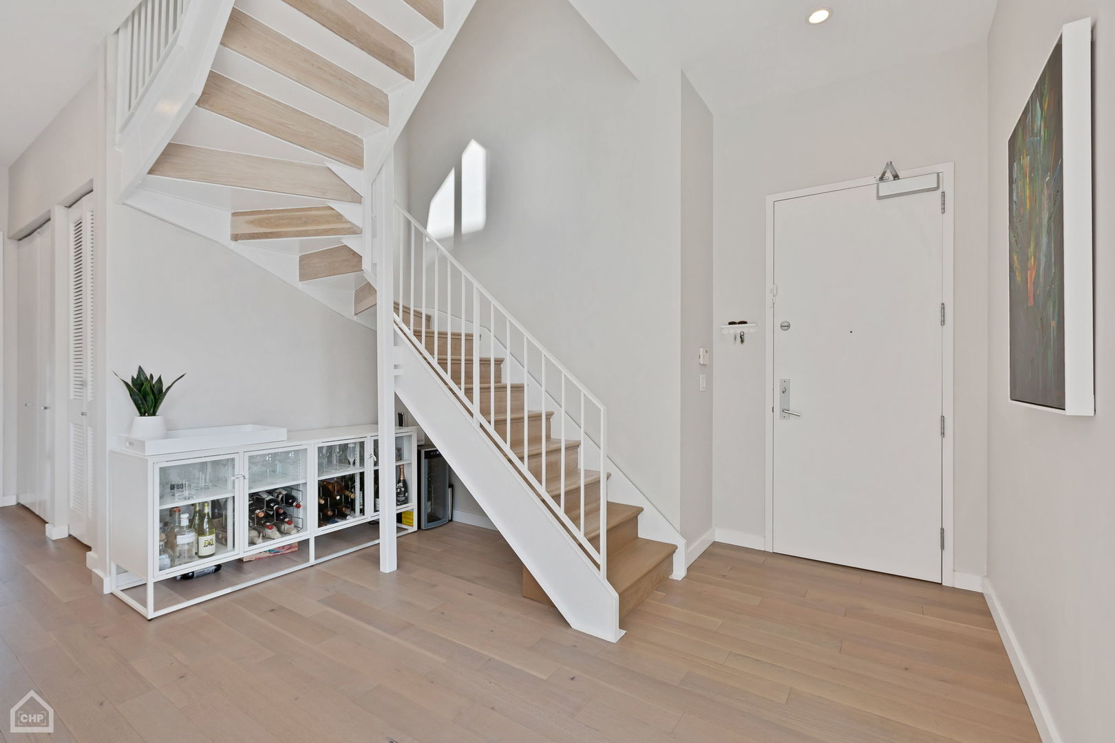 155 North Aberdeen Street, Unit 304 Chicago, IL 60607 - Photo 14 of 33 a view of entryway with wooden floor