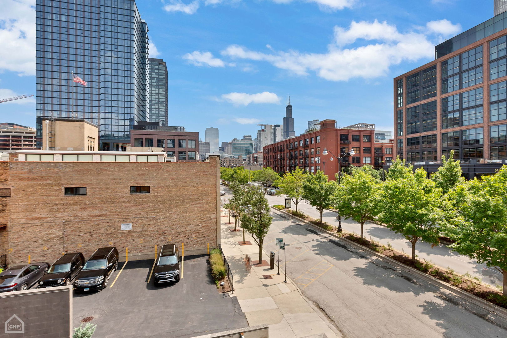 155 North Aberdeen Street, Unit 304 Chicago, IL 60607 - Photo 17 of 33 a view of a building and yard