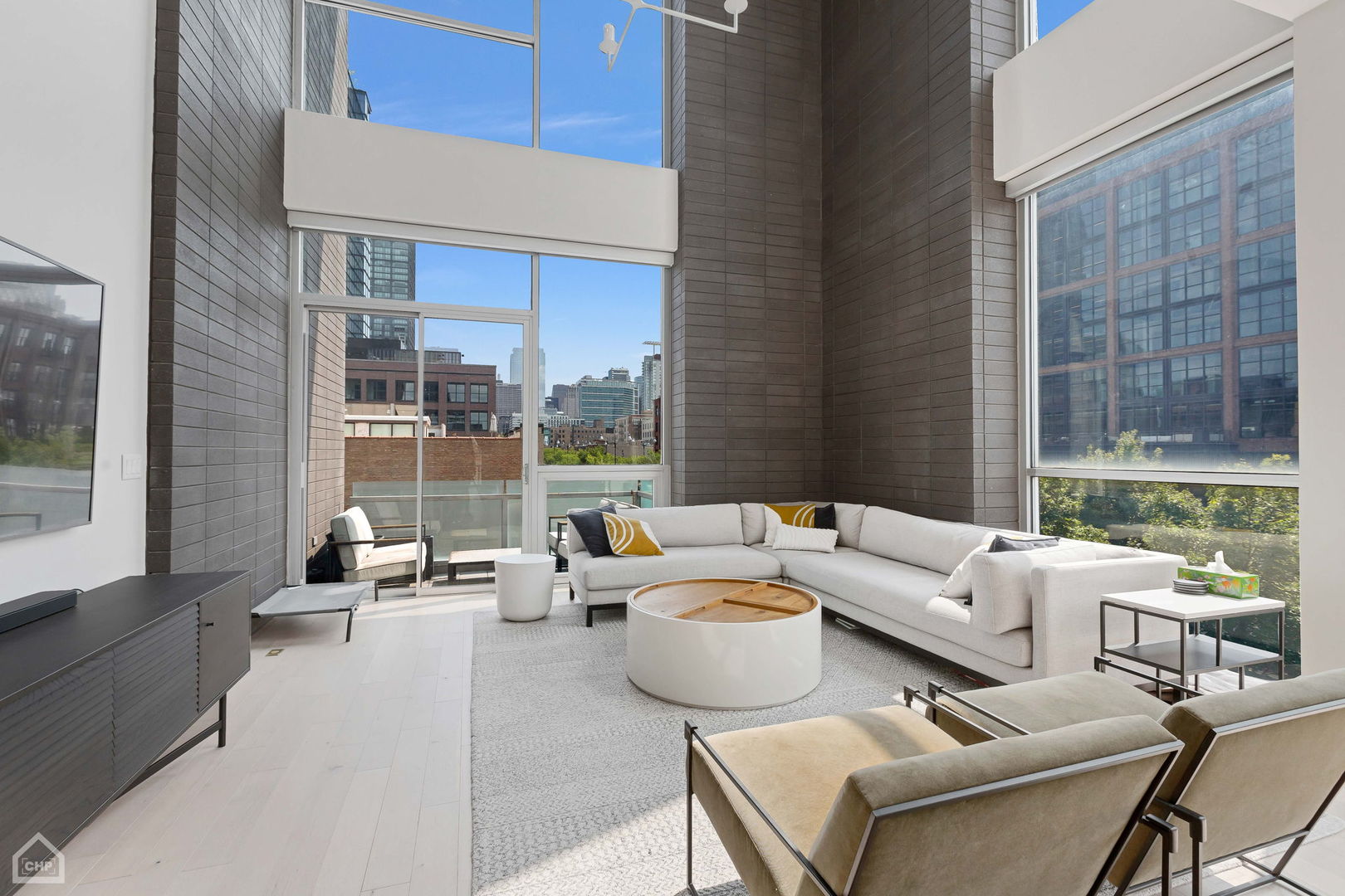 155 North Aberdeen Street, Unit 304 Chicago, IL 60607 - Photo 2 of 33 a living room with furniture and a large window