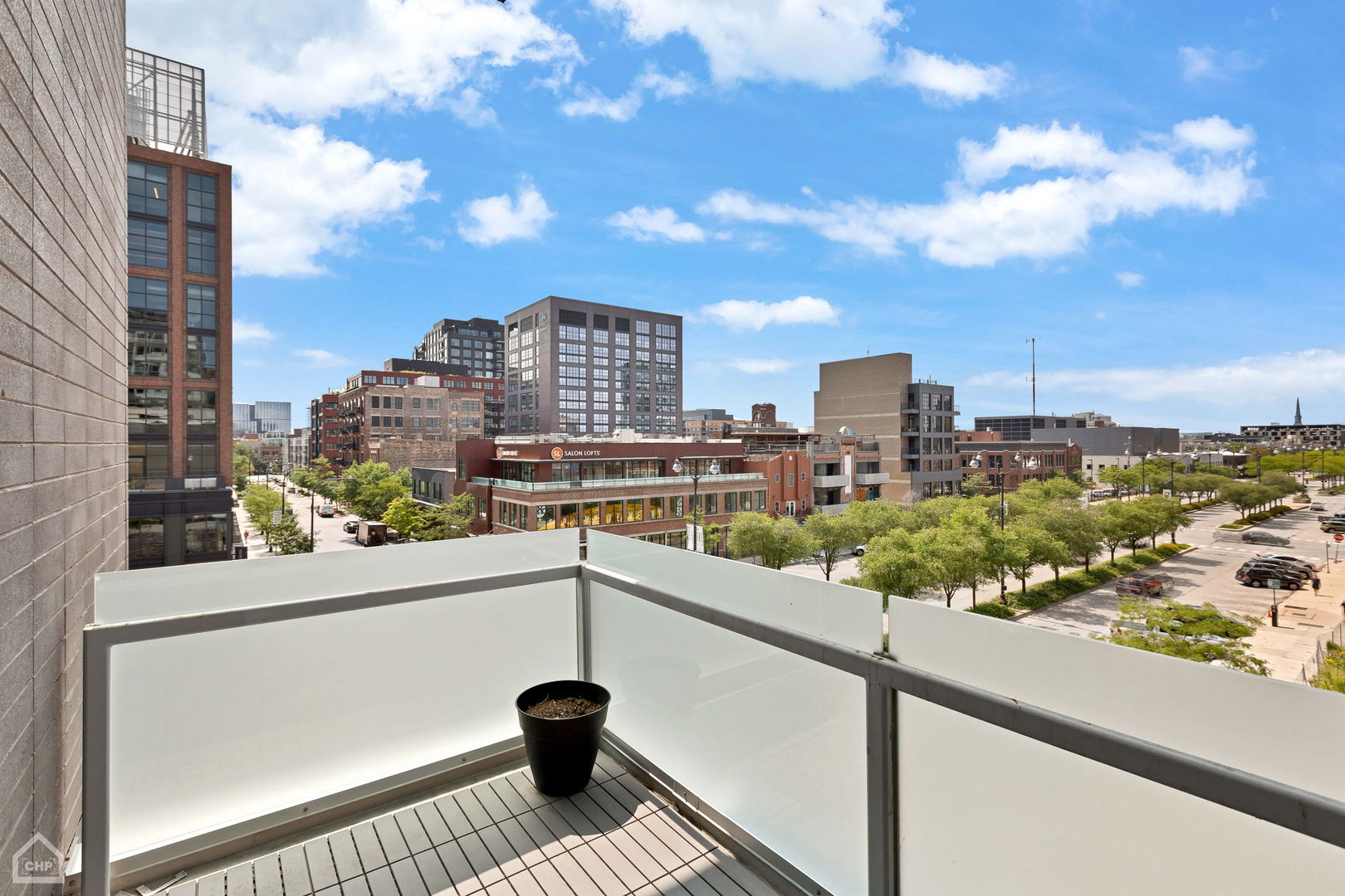 155 North Aberdeen Street, Unit 304 Chicago, IL 60607 - Photo 26 of 33 a view of a city from a balcony