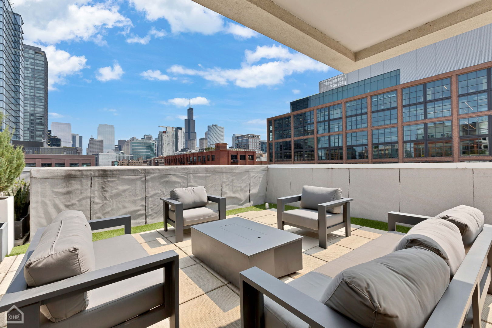 155 North Aberdeen Street, Unit 304 Chicago, IL 60607 - Photo 29 of 33 a view of a terrace with seating area