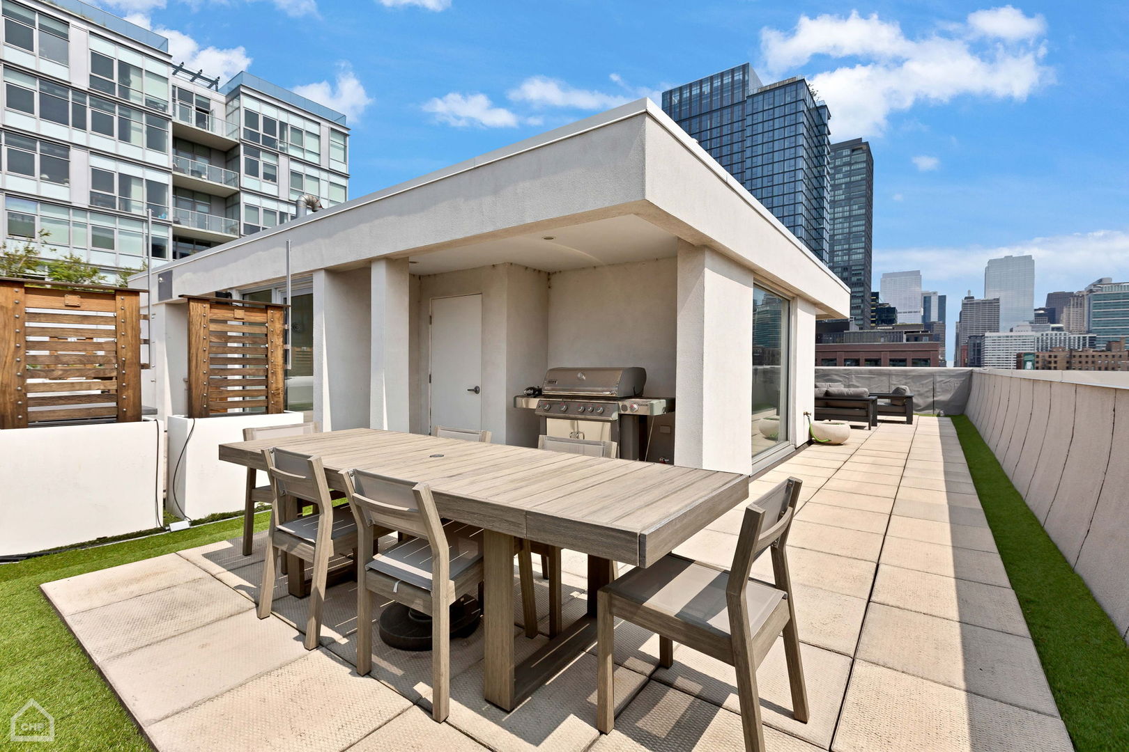 155 North Aberdeen Street, Unit 304 Chicago, IL 60607 - Photo 31 of 33 a view of a patio with a table and chairs