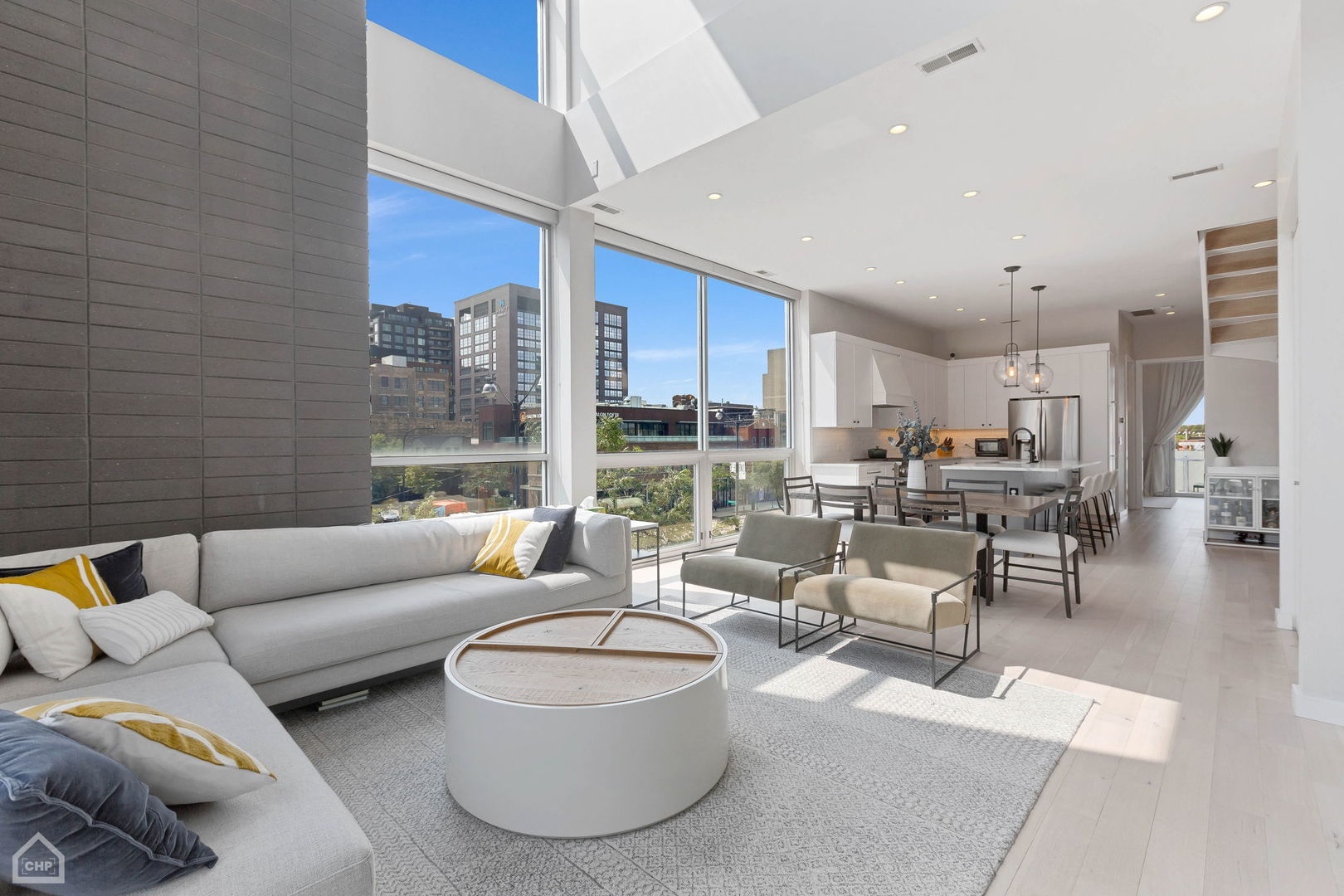 155 North Aberdeen Street, Unit 304 Chicago, IL 60607 - Photo 4 of 33 a living room with furniture and a large window
